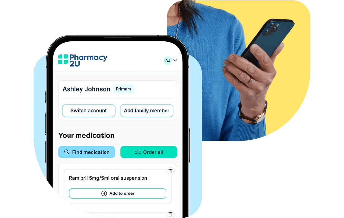 A person in a blue shirt holds a smartphone displaying a Pharmacy2U app screen with medication options.