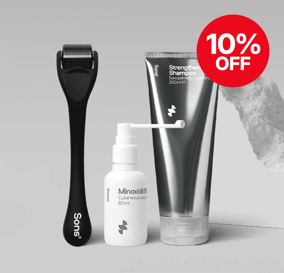 Grooming kit with derma roller, Minoxidil bottle, and shampoo tube, with a red "10% OFF" discount label on a gray background.