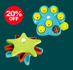 Dog puzzle toys with treats, one star-shaped and one paw-shaped. Red "20% off" label on a teal background.