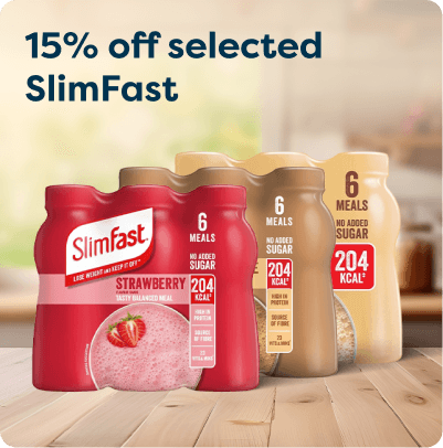 Four SlimFast meal shake bottles on a wooden surface, with text offering 15% off selected items.