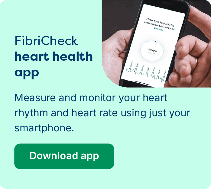 Banner for FibriCheck heart health app with smartphone images, text promoting heart rate monitoring, and a "Download app" button. Approved by ORCHA.