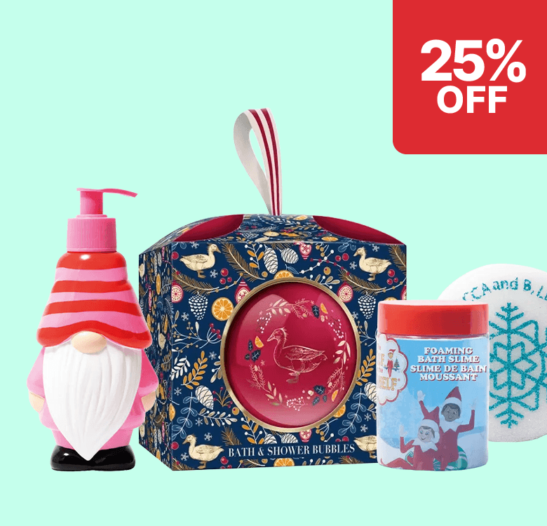 Festive bath gift set with a gnome-themed lotion, decorative boxed bath bubbles, bath slime, and a round soap. "25% OFF" is shown in the corner.