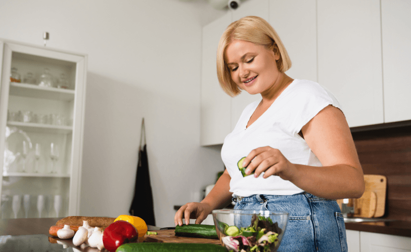 Woman preparing a salad