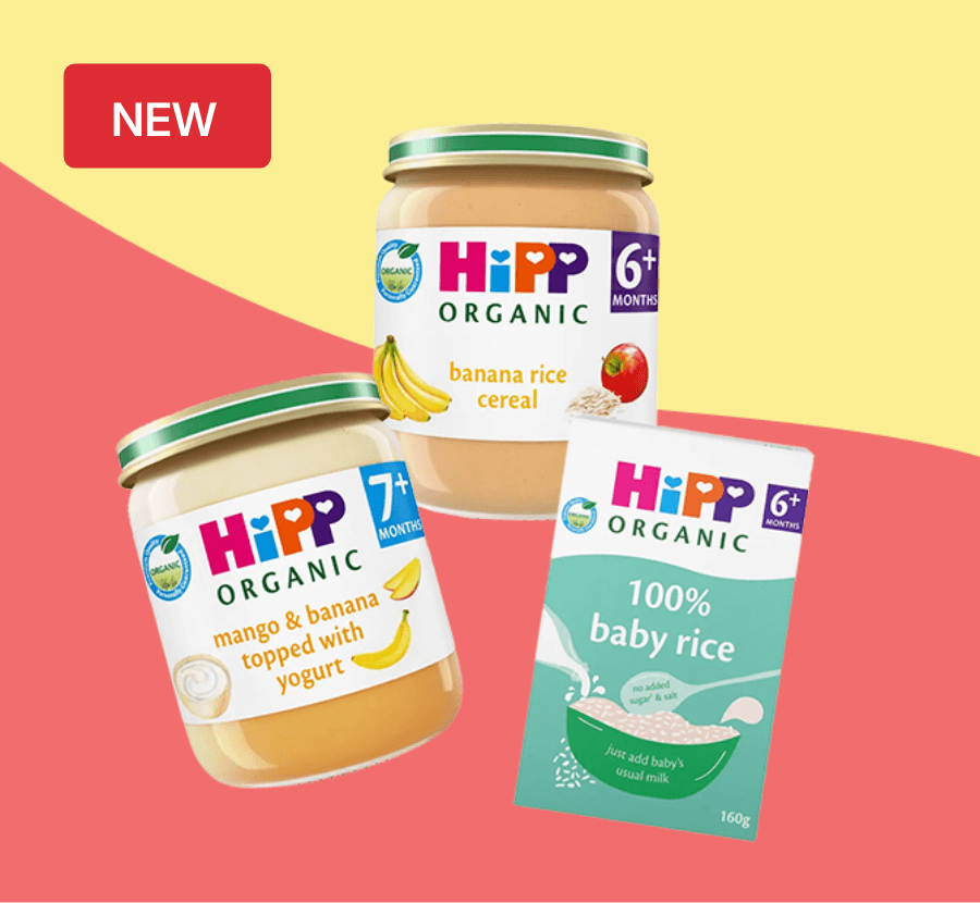 Three jars of HiPP Organic baby food: banana rice cereal, mango & banana with yogurt, and a box of 100% baby rice with a "NEW" label.