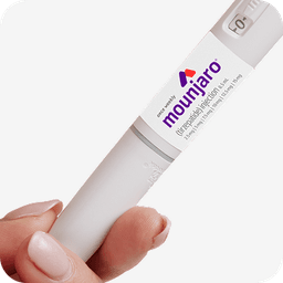 A hand holding a Mounjaro injection pen with a label indicating it is a once-weekly tirzepatide injection for subcutaneous use.