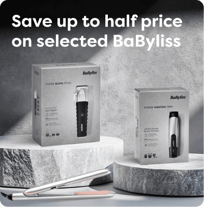 BaByliss hair clipper and trimmer on marble stands, with a flat iron, under a "Save up to half price" promotion.