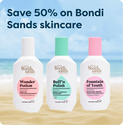 Save 50% on Bondi Sands Skincare at Pharmacy2U. Three Bondi Sands skincare products are displayed on a sandy beach with the ocean in the background.
