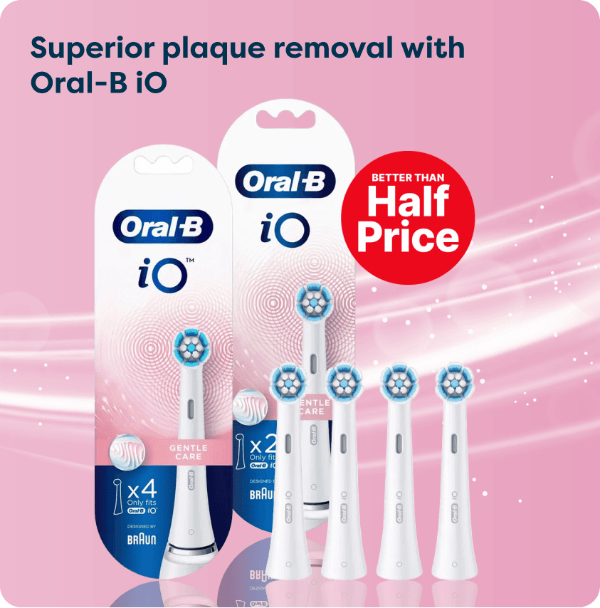 Oral-B iO toothbrush heads with packaging, highlighting "Better Than Half Price" offer and "Superior plaque removal" on a pink background.