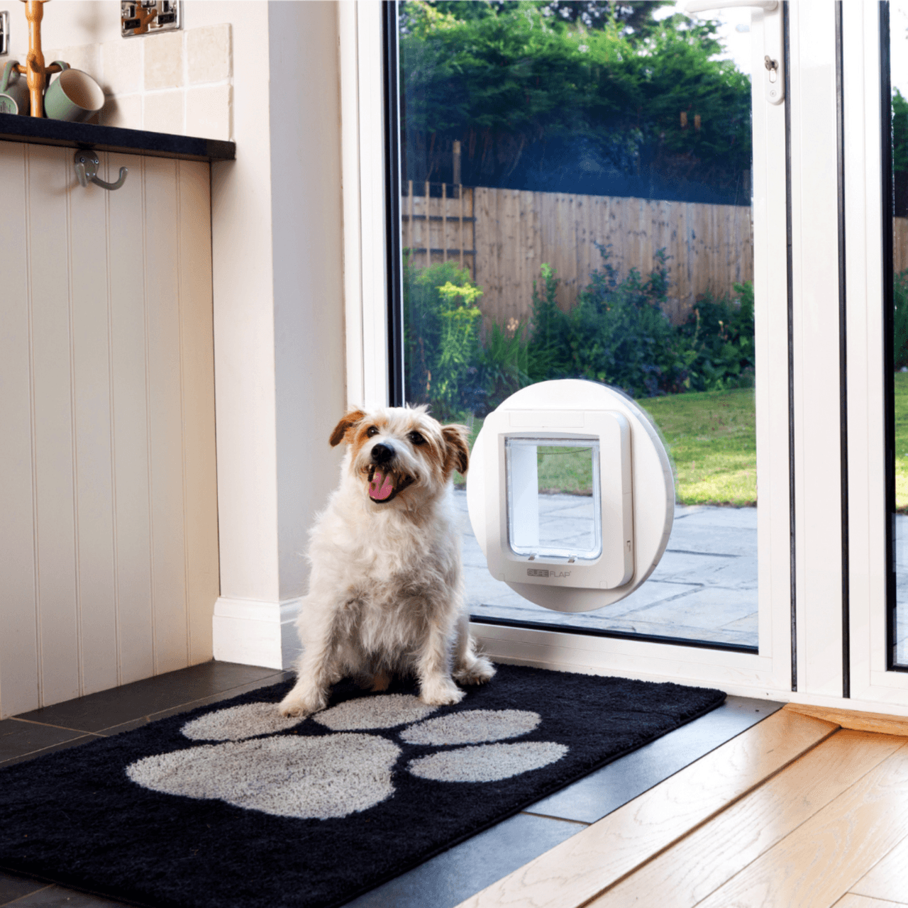 SureFlap Microchip Pet Door Mounting Adaptor - White Image https://cdn11.bigcommerce.com/s-g585yu857h/images/stencil/1280w/products/14164/24498/Microchip-Pet-Door-Mounting-Adaptor---White__05423.1764229632.png1