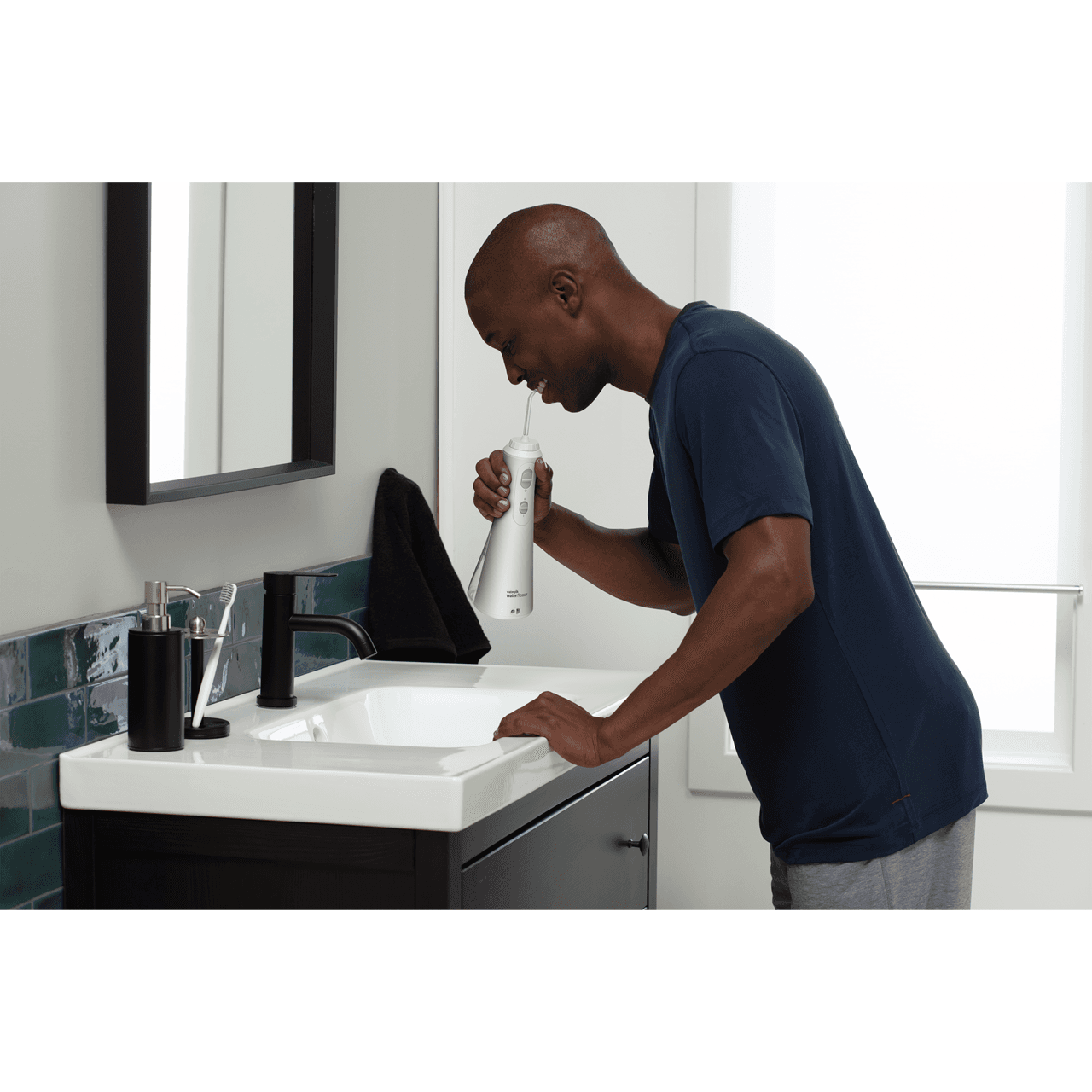 Waterpik Water Flosser Cordless Plus White Image https://cdn11.bigcommerce.com/s-g585yu857h/images/stencil/1280w/products/1469/12715/0073950317412_T60__69331.1743427229.png1