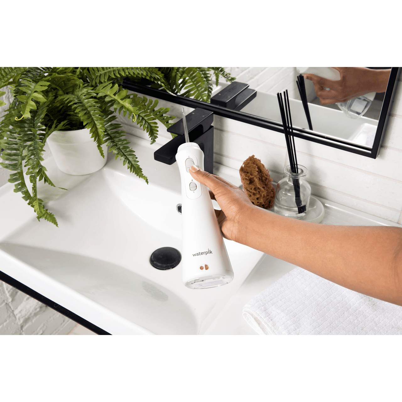 Waterpik Water Flosser Cordless Plus White Image https://cdn11.bigcommerce.com/s-g585yu857h/images/stencil/1280w/products/1469/12716/0073950317412_T62__98464.1743427229.png1