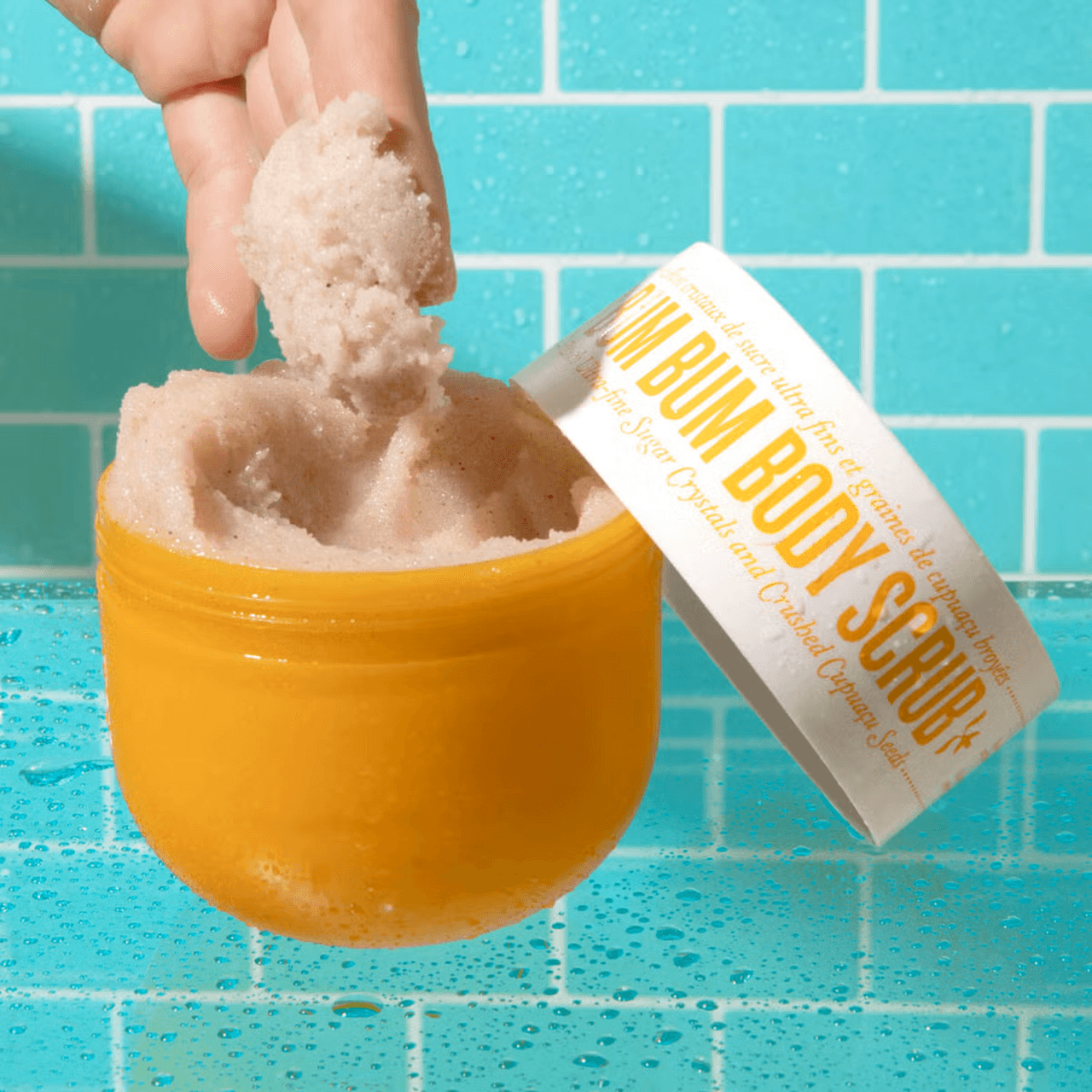 Sol De Janeiro Bum Bum Scrub 220g Image https://cdn11.bigcommerce.com/s-g585yu857h/images/stencil/1280w/products/3548/6325/Sol-De-Janeiro-Bum-Bum-Scrub__99375__34010.1740667958.png1